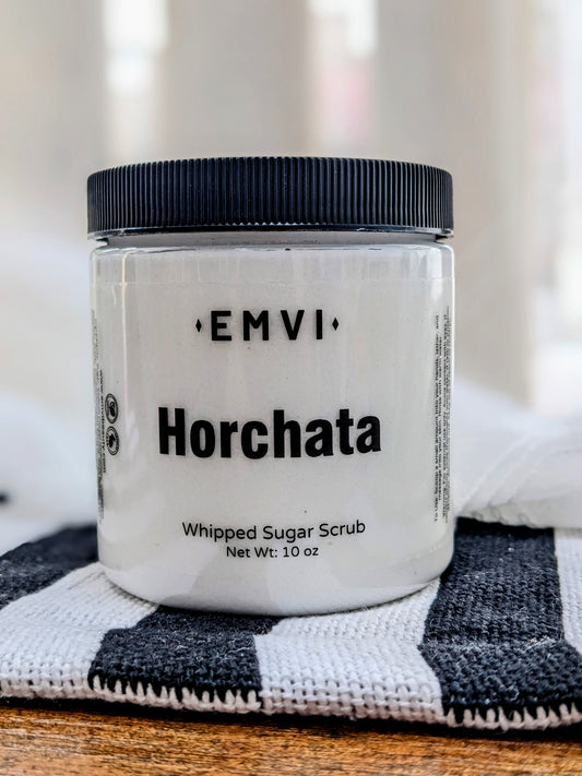 8 oz clear jar of Horchata whipped sugar scrub with black lid
